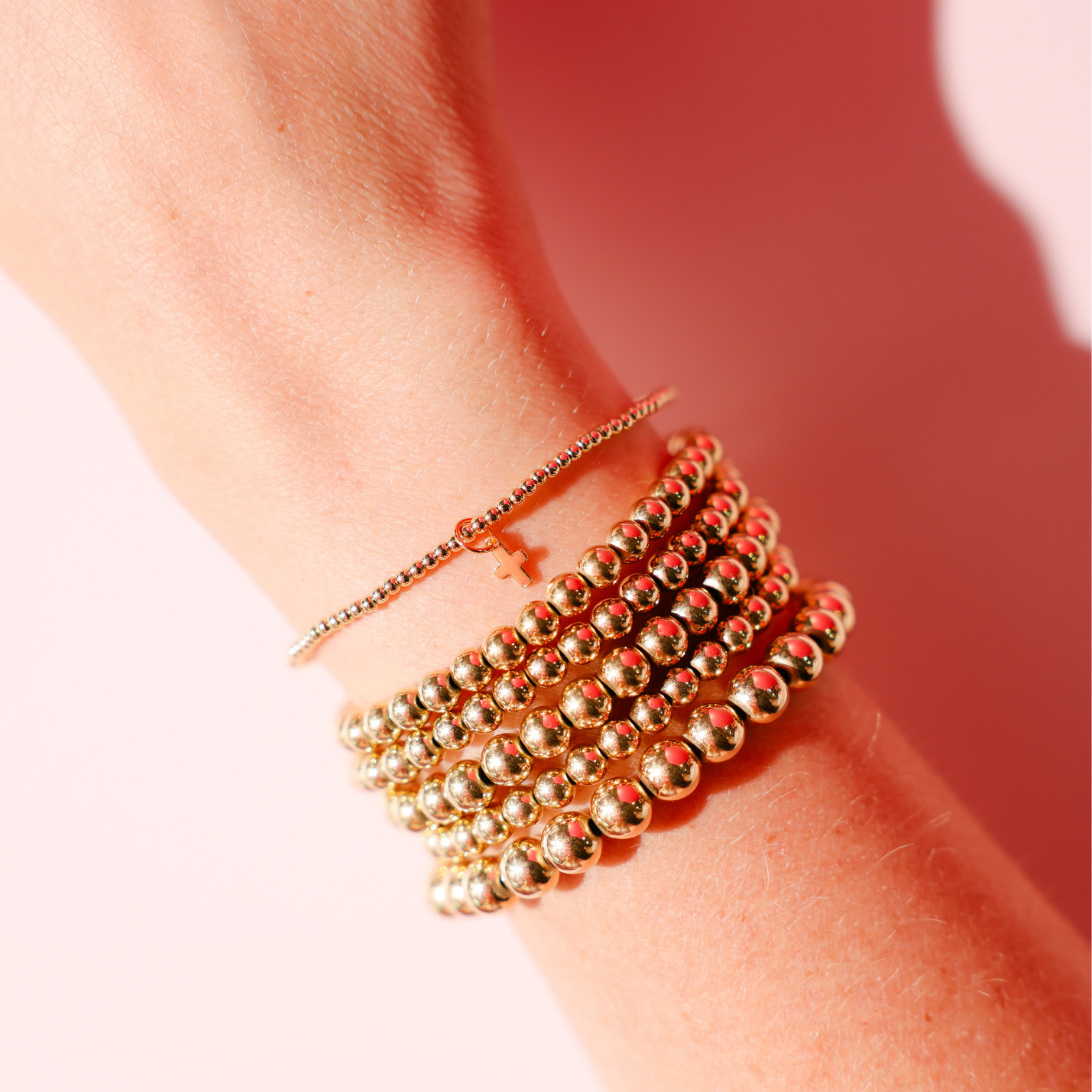 Mini Cross Charm on 2MM Gold Bracelet