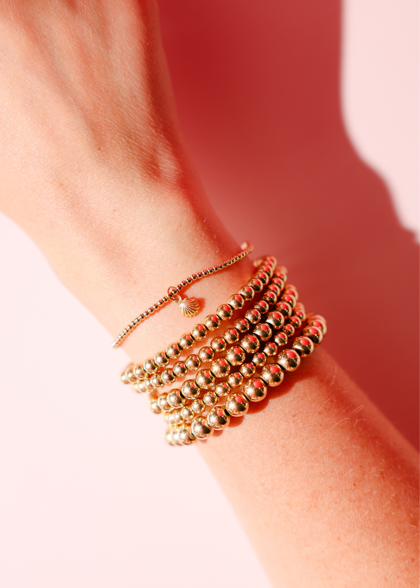 Mini Shell Charm on 2MM Gold Bracelet