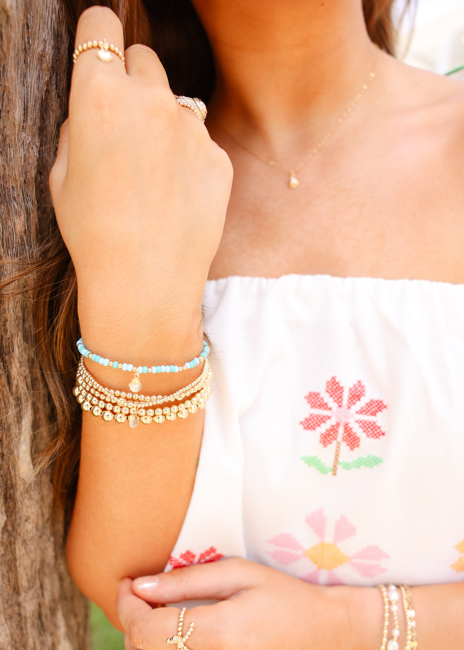 Mini Shell Charm on 2MM Gold Bracelet