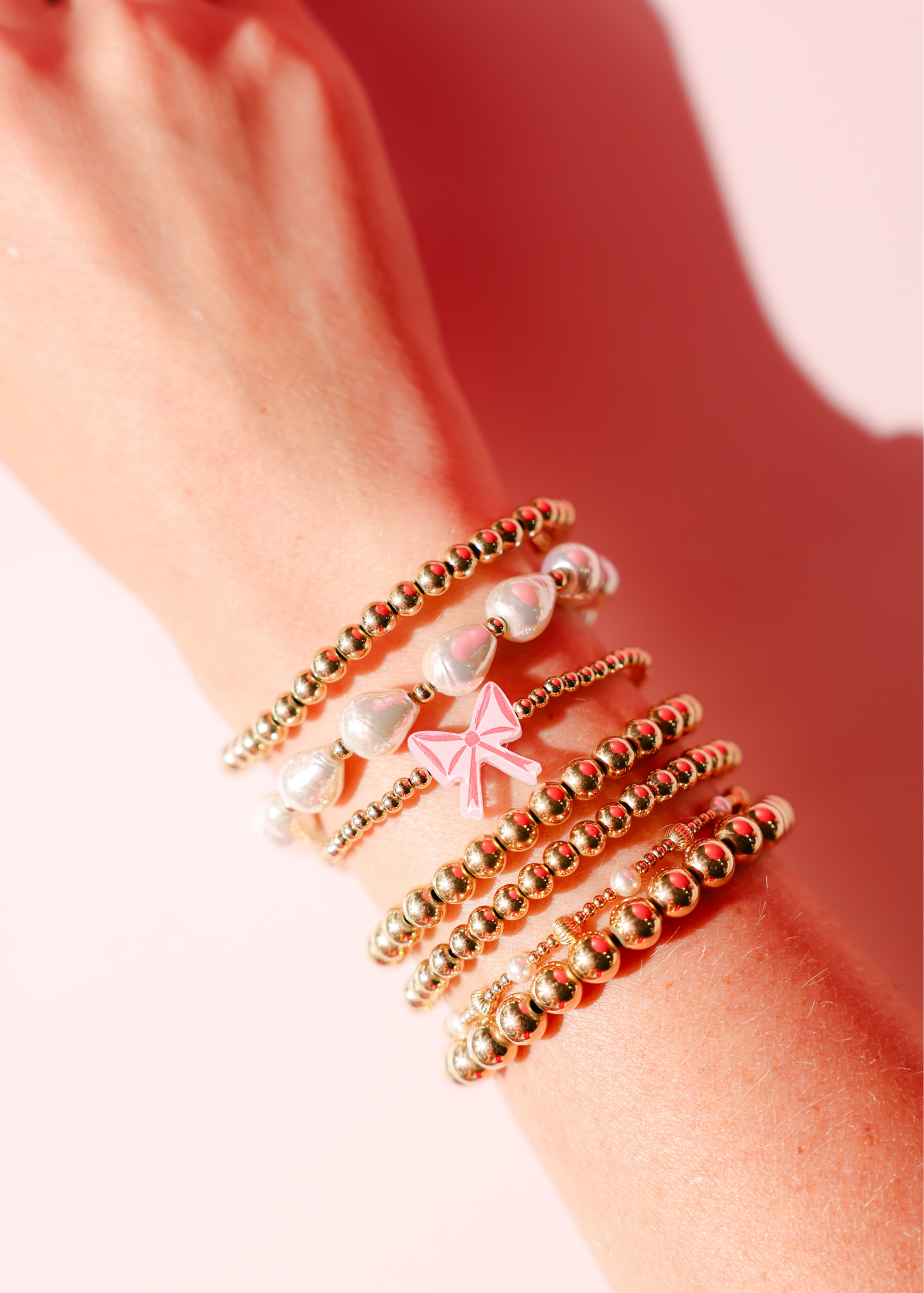 Red Bow Bracelet on Gold