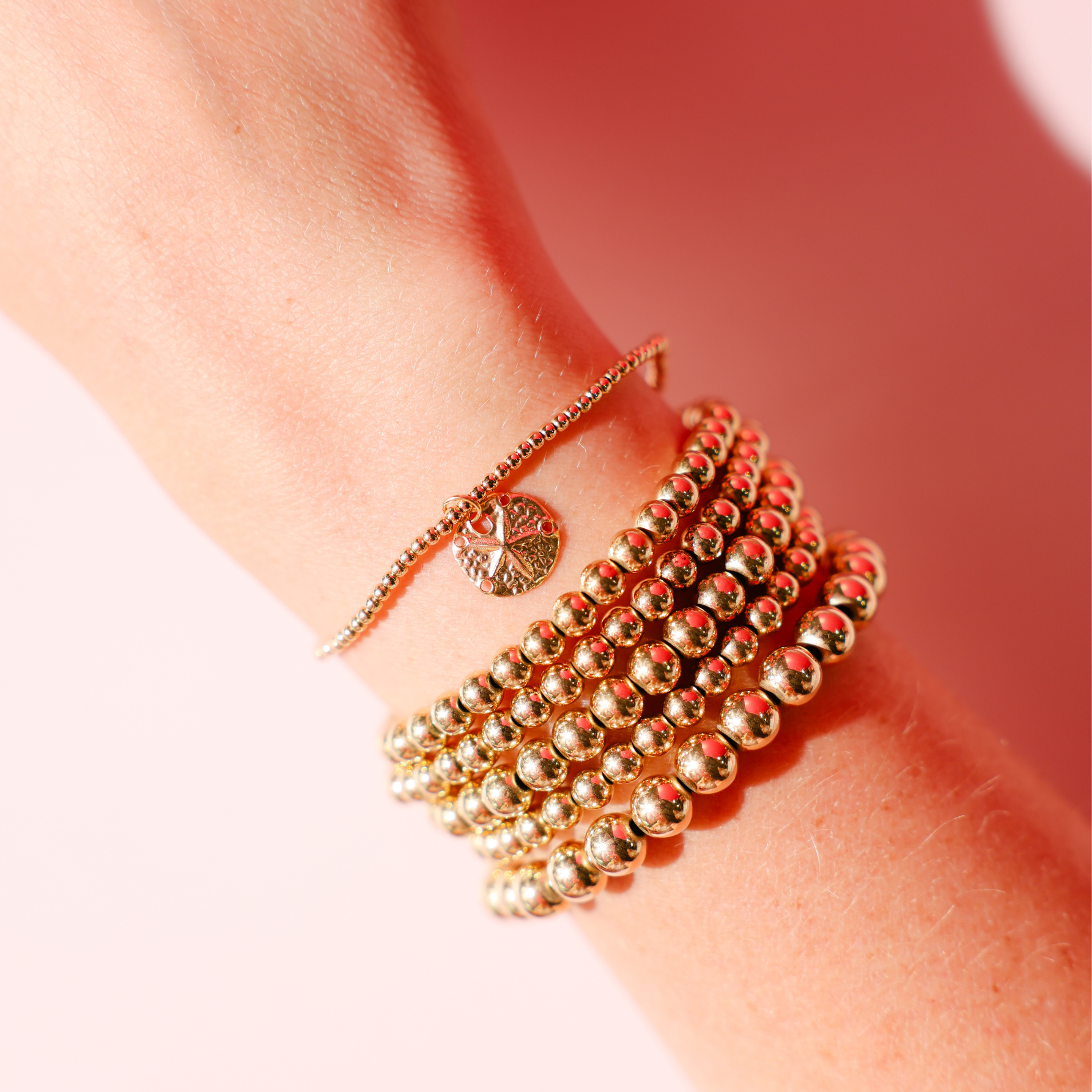 Sand Dollar Charm on 2MM Gold Bracelet