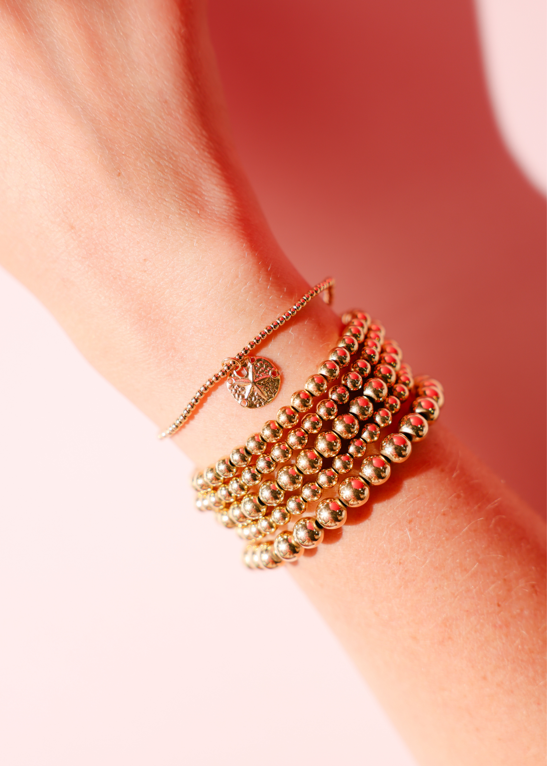 Sand Dollar Charm on 2MM Gold Bracelet